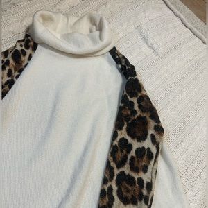 Cream knit sweater with cheetah print sleeves